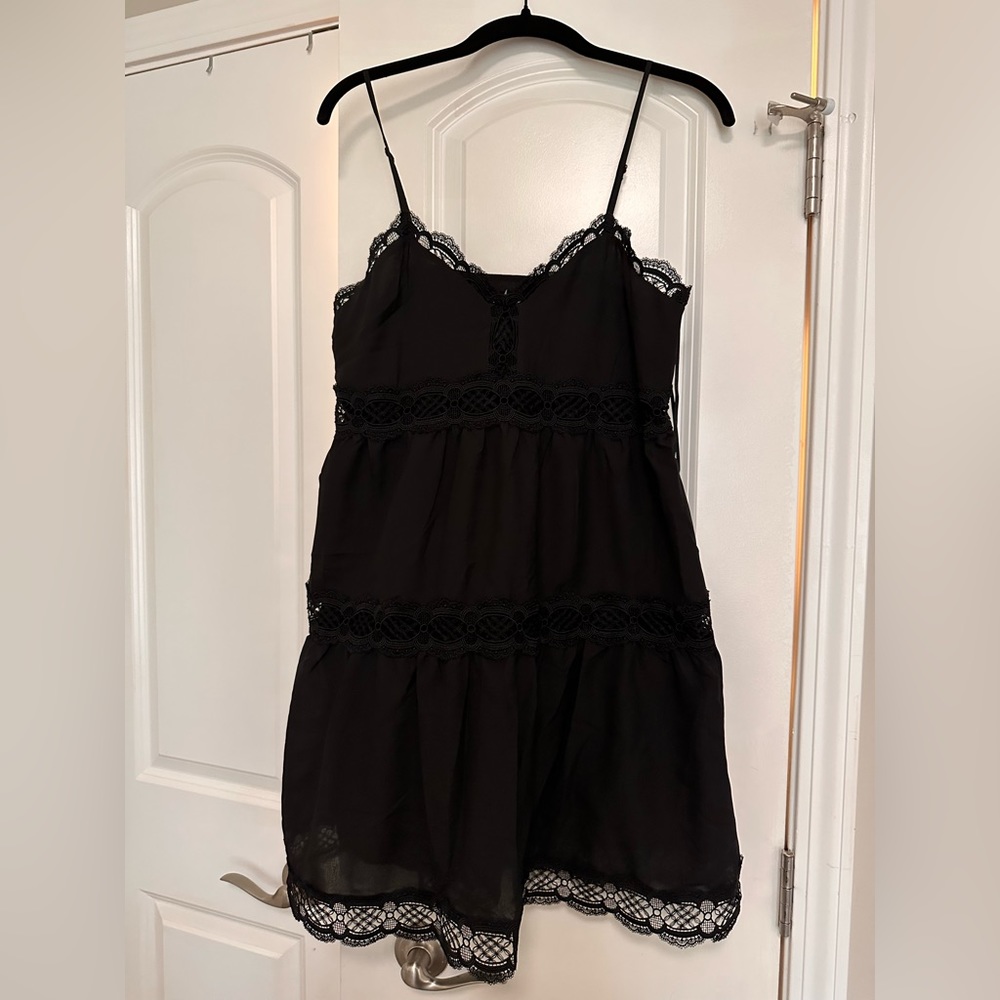 Black, spaghetti strap dress.
